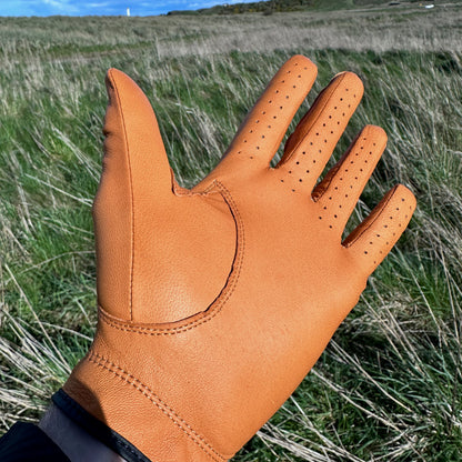 Golfer's point of view while wearing The Links Glove, looking at the dunes with the fairway ahead.