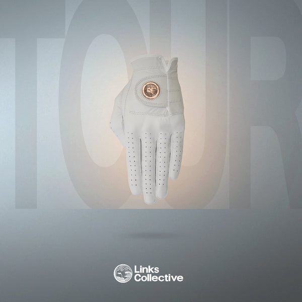 A Links Collective premium golf glove in white, showcasing the soft Cabretta leather and precision stitching. Glove has a removable forged iron ball marker on back. Best quality and highly rated reviews